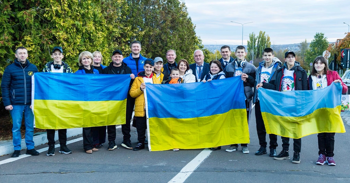 Ukrainian children rescued from Russian deportation return home